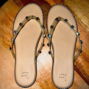 A new day (target brand) nude sandal with silver embellishments.